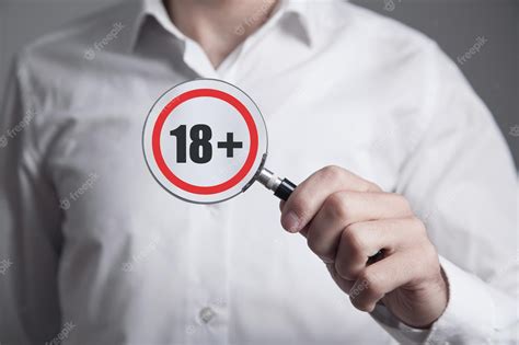 Premium Photo Man Showing 18 Adult Symbol