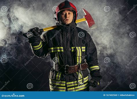 Handsome Strong Fireman With Hammer Stock Photo Image Of Adventurer