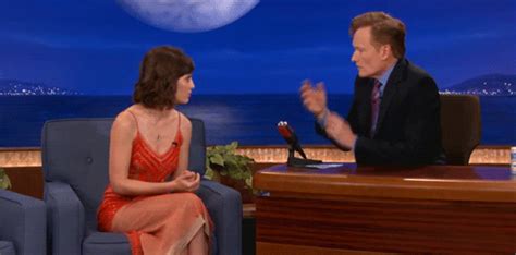 Conspiring Lizzy Caplan  By Team Coco Find And Share On Giphy