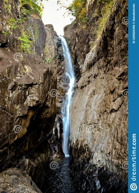 Longtime Exposure Of Waterfall And Rocks In Landscape Stock Photo