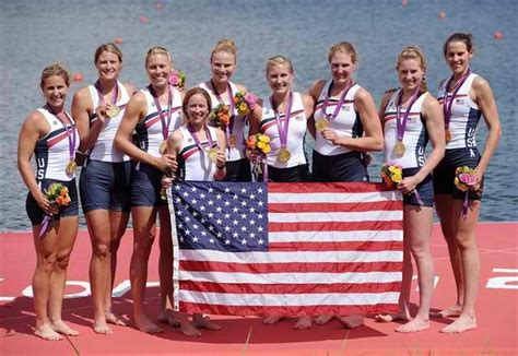 Members Of The Us Rowing Team Celebrate With Their Gold Medals And