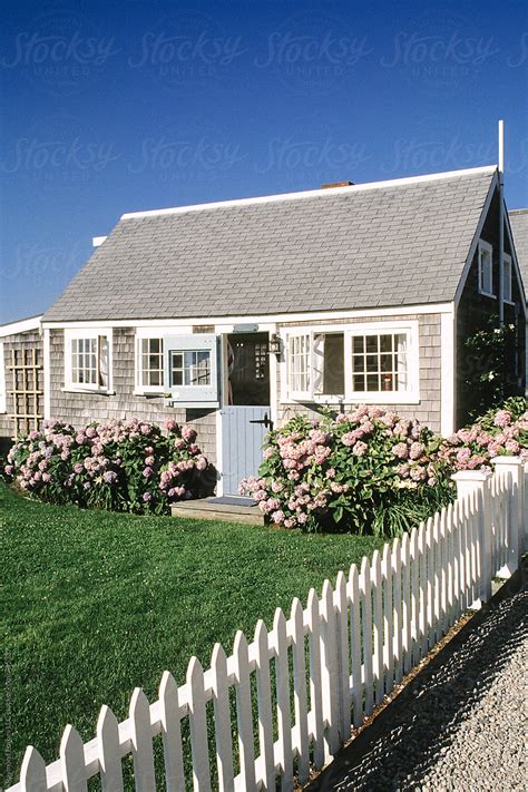 Nantucket Massachusetts Cottage Architecture With White Picket Fence