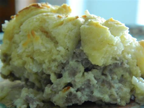 While cooking the sausage, cut each biscuit into 8 pieces and place in the bottom of a 9×13 baking dish sprayed with cooking spray. Breakfast Bubble-up Casserole