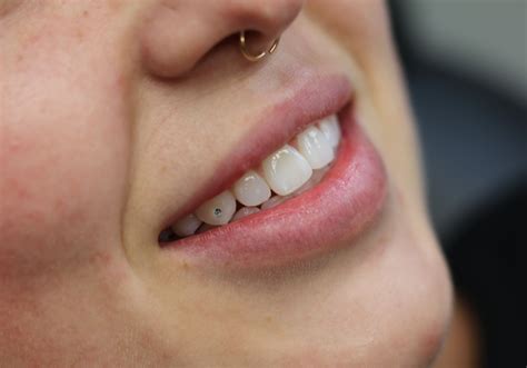 Best Way To Bring Attention To Your Smile Piercing Tattoo Nose