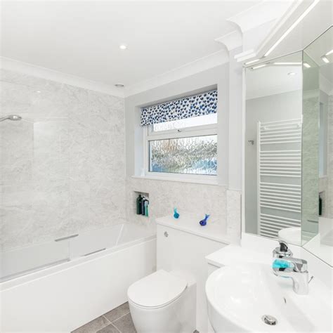 Trust us, you'll want to live in these stunners. Modern White Bathroom
