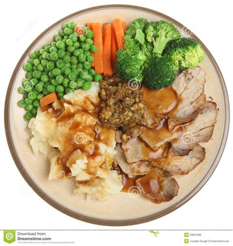 Spicy pork roast with rosemary potatoes sunny takes one portion of pork roast and sections into four separate steaks. Roast Pork Dinner Royalty Free Stock Image - Image: 33621936