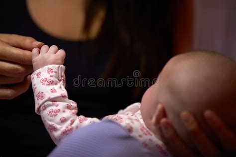 Mother Holding Newborn Son In Hands Loving Mother Hand Holding Cute