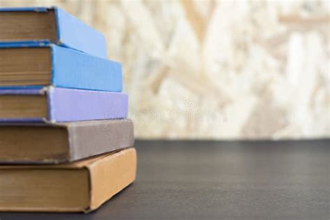 Stack Of Old Books On Blur Wood Background Stock Image Image Of Macro