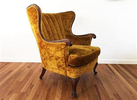 This is an armless accent chair constructed with soft velvet and a robust wood frame. Vintage channel wingback chair with original yellow ...