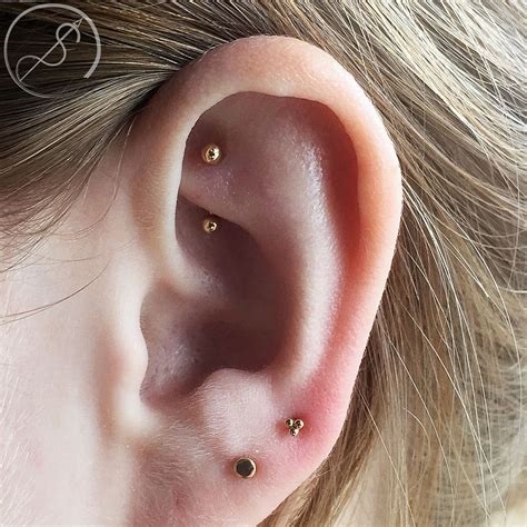 Rook Piercing With 14k Gold Barbell Done At Piercing Experience In