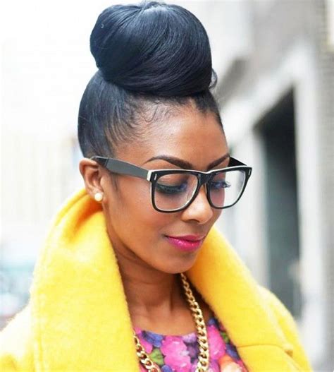 Show Off Super Smooth Strands With A Big Bun Afro Hair Style Curly