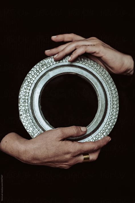 Anonymous Hands Holding A Round Mirror By Vera Lair Stocksy United