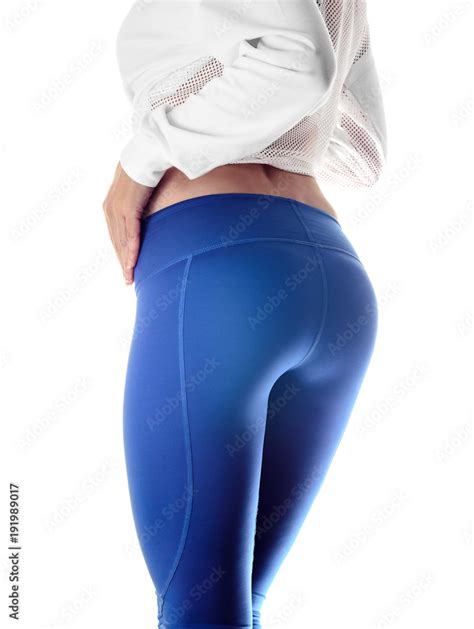closeup of fitness woman with fit cheeks tight hips and firm buttocks in workout leggins