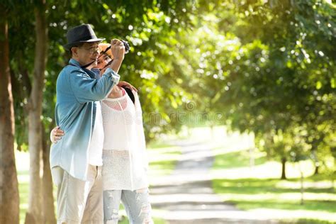Happy Romantic Asian Senior Couple Outdoor In Park Stock Photo Image