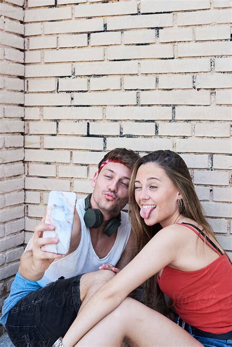 Lovely Couple Taking Selfies By Stocksy Contributor Ivan Gener