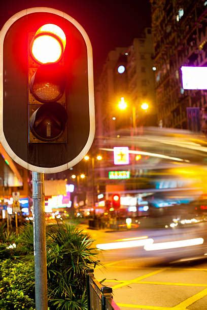Red Traffic Light At Night Stock Photos Pictures And Royalty Free Images