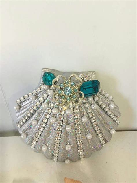 Scallops are mollusks that have two beautiful convexly ridged, or scalloped, shells. Scallop shell | Shell crafts, Scallop shell craft ...