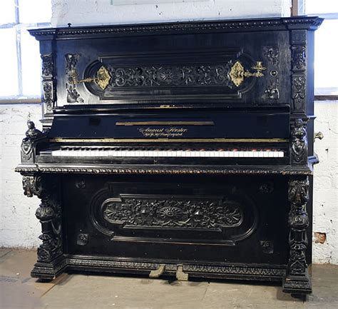 August Forster Upright Piano For Sale With An Ornately Carved Black