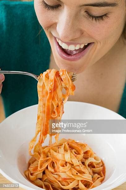 Eating Tomato Pasta Photos And Premium High Res Pictures Getty Images