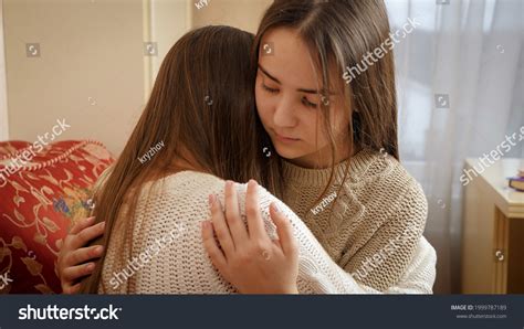 Upset Teenage Girl Crying Her Friends Stock Photo 1999787189 Shutterstock