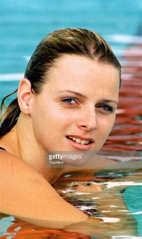 Charlene Wittstock Of South Africa Poses In The Pool During The Xvi Commonwealth Games In