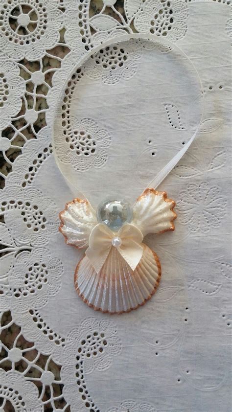 01 This Handmade Seashell Angel Ornament Measures 2 X 2 X 3 8 And