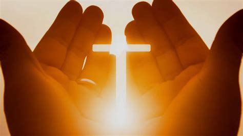 Cross Between Hands In White Sky Background Hd Christian Wallpapers