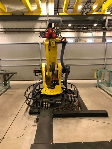 Spot welding robots | robotic spot welding and material joining solutions. GENESIS / FANUC FLOOR-MOUNTED SINGLE-ROBOT SPOT WELDING ...