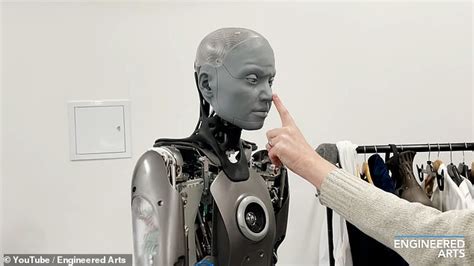 Robot Worlds Most Advanced Humanoid Bot Grabs A Researchers Hand