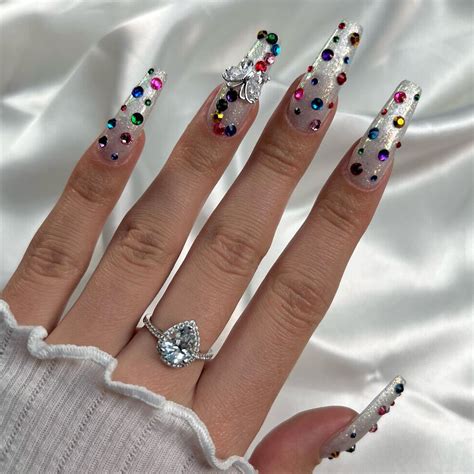 7 Stunning Pearl Nail Designs To Try Out For A Subtle And Classy Look
