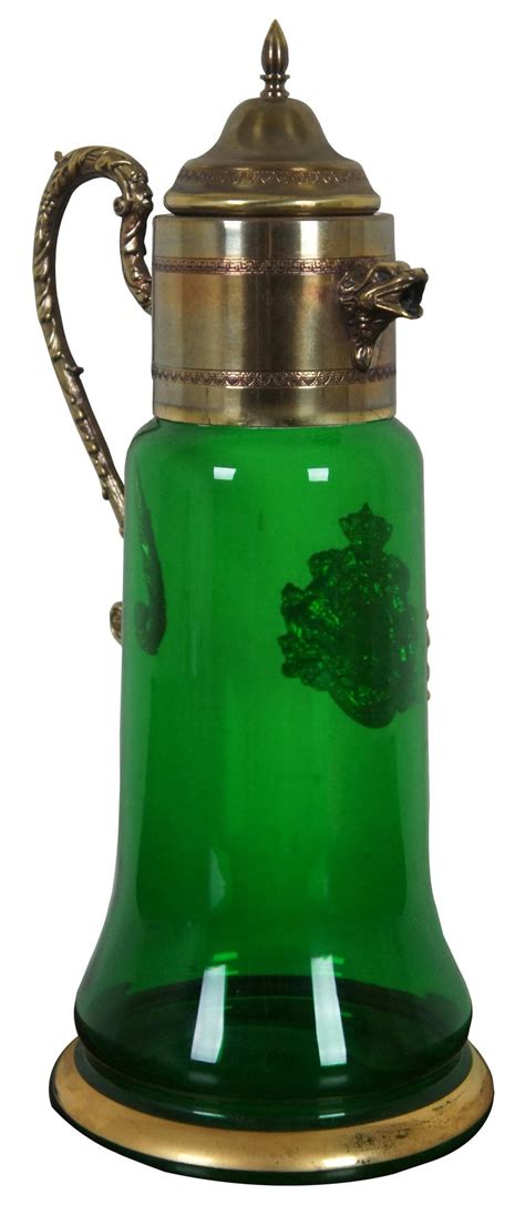Vintage Green Bohemian Glass And Brass Carafe Pitcher Coat Of Arms Figural Lions For Sale At 1stdibs