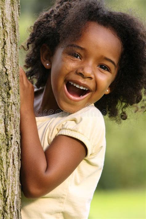 African American Child Happy African American Child Playing In A Park
