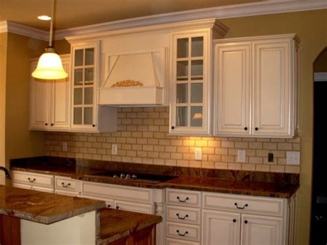 Distressing creates the impression of patina and old age. Painted, Distressed Kitchen Cabinets - Traditional ...