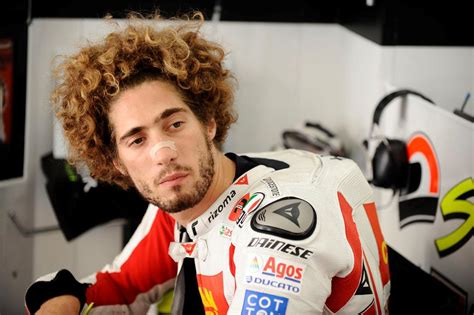 Marco's father paolo simoncelli is comforted after learning of his son's death. Marco Simoncelli to become MotoGP legend | MCN