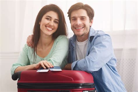 Ready For Vacation Couple With Suitcase And Tickets Stock Image Image Of Female Looking