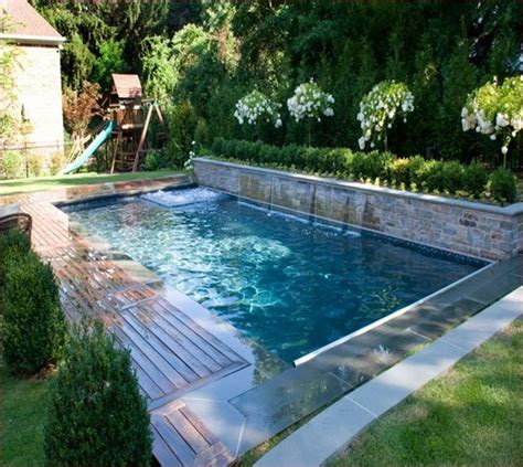 Small inground swimming pool surrounded by greens and shrubs is an incredible idea to transform the look of your space. 35+ Gorgeous Small Backyard Pool Design For Great Pleasure ...