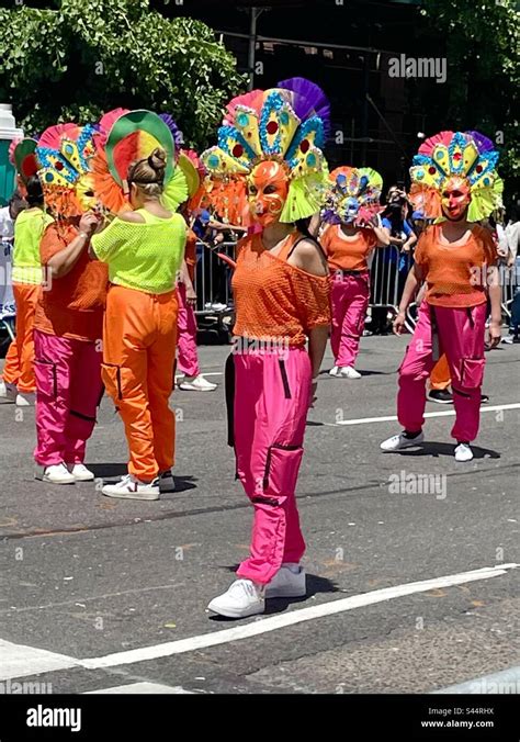 Dancers In Colorful Masks And Costumes In Filipino Parade New York City