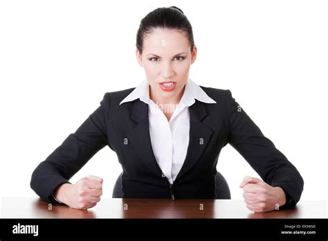 Angry Businesswoman At The Desk Stock Photo Alamy