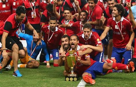 منذ 4 ساعات بعد الاعلان. Egypt's AlAhly's players celebrate with their trophy after ...