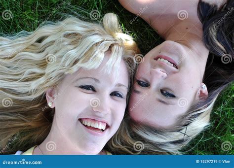 Two Girl Friends Laying In Grass Stock Image Image Of Happiness Green 15297219
