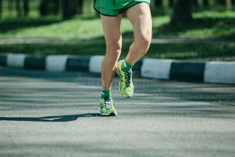 Marathon Runner Legs And Running Sneakers Of Man Jogging Outdoor Stock Image Image Of Athlete