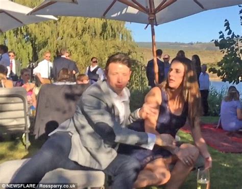Hilarious Moment Brit Stops His Girlfriend Catching A Wedding Bouquet