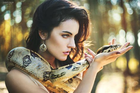 Woman With A Snake Snaekda