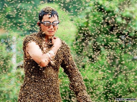 Amazing Records Of Men Covered With Bees