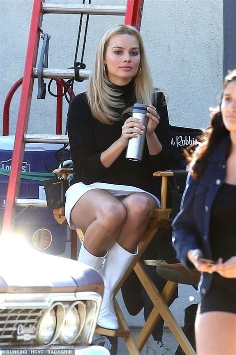 Margot Robbie Portrays Sharon Tate In A Miniskirt And Go Go Boots On