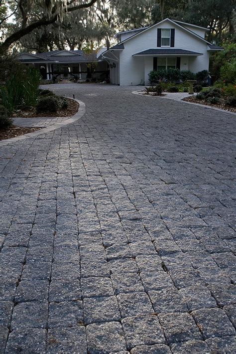 A Unique Split Faced Tumbled Paver Mimicking Granite Cobbles With An