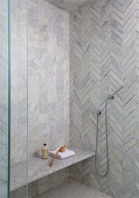 herringbone tile shower walls