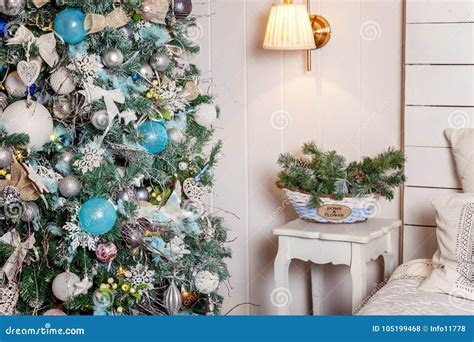 Christmas Tree with White, Blue and Silver Decorations Stock Photo