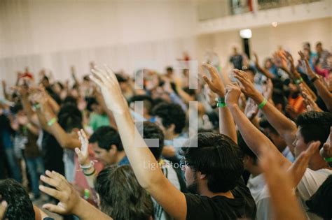 Hands Raised During A Worship Service — Photo — Lightstock