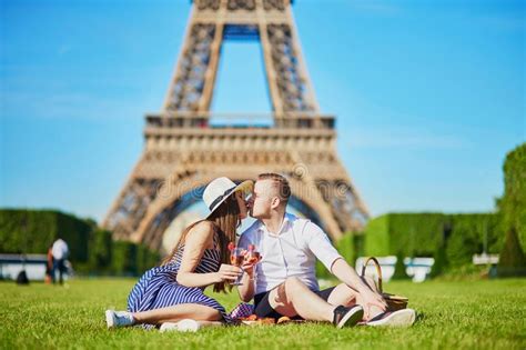 Couple Having Picnic Near The Eiffel Tower In Paris Stock Image Image
